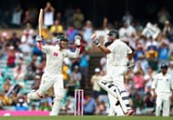 SYDNEY, AUSTRALIA - JANUARY 04: Michael Clarke (L) of Australia is congratulated by Michael Hussey (R) of Australia after reaching his double century during day two of the Second Test Match between Australia and India at the Sydney Cricket Ground on January 4, 2012 in Sydney, Australia. He went on to score a career best of 329*.