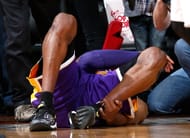 Kobe Bryant #24 of the Los Angeles Lakers falls the floor after missing the game-tying basket in the final seconds of their 96-92 loss to the Atlanta Hawks at Philips Arena on March 13, 2013 in Atlanta, Georgia.