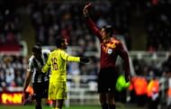NEWCASTLE UPON TYNE, ENGLAND - MARCH 14: FC Anji player Mehdi Carcela-Gonzalez is sent off by referee Deniz Aytekin during the UEFA Europa League Round of 16 second leg match between Newcastle United FC and FC Anji Makhachkala at St James' Park on March 14, 2013 in Newcastle upon Tyne, England. (Photo by Stu Forster/Getty Images)