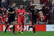 SOUTHAMPTON, ENGLAND - MARCH 16: (THE SUN OUT, THE SUN ON SUNDAY OUT) Philippe Coutinho of Liverpool celebrates after scoing a goal during the Barclays Premier League match between Southampton and Liverpool at St Mary's Stadium on March 16, 2013 in Southampton, England. (Photo by John Powell/Liverpool FC via Getty Images)