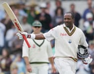 Brian Lara of the West Indies celebrates after scoring his record 11175th career Test run to become the most prolific scorer in Test history surpassing former Australian batsman Allan Border's mark of 11174 runs during day two of the Third Test between Australia and the West Indies played at the Adelaide Oval on November 26, 2005 in Adelaide, Australia. (Photo by Hamish Blair/Getty Images)