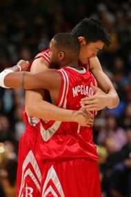 OAKLAND, CA - NOVEMBER 29: Tracy McGrady #1 and Yao Ming #11 of the Houston Rockets embrace before a game against the Golden State Warriors November 29, 2007 at Oracle Arena in Oakland, California. NOTE TO USER: User expressly acknowledges and agrees that, by downloading and or using this photograph, user is consenting to the terms and conditions of Getty Images License Agreement. Mandatory Copyright Notice: Copyright 2007 NBAE (Photo by Rocky Widner/NBAE via Getty Images)