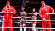 Brodus Clay and Tensai with the Funkadactyls Naomi and Cameron