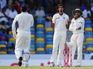 Indian bowlers Ishant Sharma (C) and Har