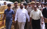 Chief Organiser of the New Delhi Commonwealth Games, Suresh Kalmadi (C) is escorted by Central Bureau of Investigation (CBI) officials to the court in New Delhi on April 26, 2011. The chief organiser of the Delhi 2010 Commonwealth Games appeared on court on corruption charges after a probe into alleged financial wrong-doing at the event.