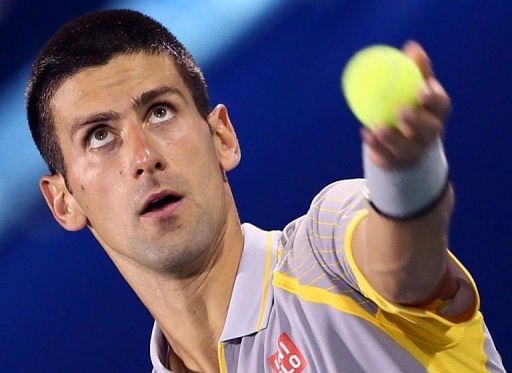 Novak Djokovic serves at the Dubai Open on February 28, 2013