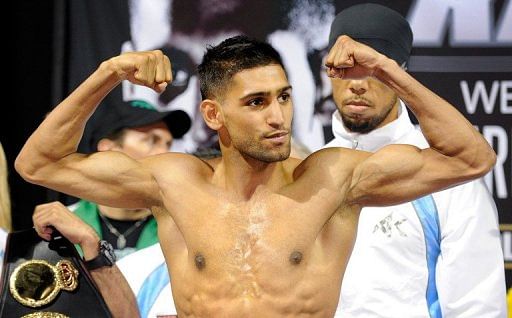 Amir Khan poses during a weigh-in at the Mandalay Bay Resort &amp; Casino on July 13, 2012 in Las Vegas