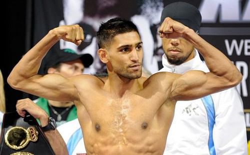 Amir Khan poses during a weigh-in at the Mandalay Bay Resort & Casino on July 13, 2012 in Las Vegas