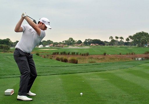 Branden Grace of South Africa plays a tee shot at the Honda Classic on February 28, 2013 in Palm Beach Gardens, Florida