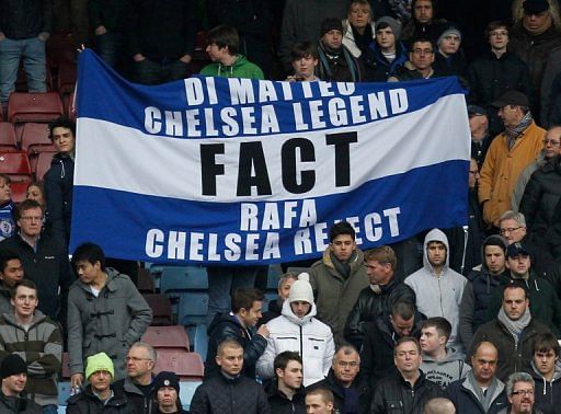 Chelsea supporters hold a banner against Rafael Benitez during a match against West Ham in London on December 1, 2012