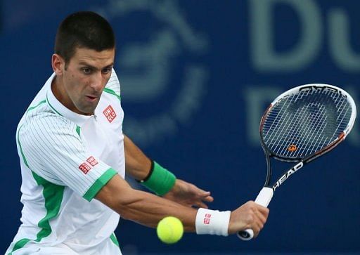 Serbia&#039;s Novak Djokovic returns the ball to Argentina&#039;s Juan Martin Del Potro on March 1, 2013