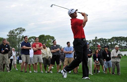 Luke Guthrie of USA plays a shot on the ninth hole of the Honda Classic on March 1, 2013 in Palm Beach Gardens, Florida