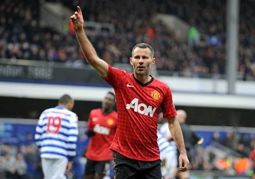 Manchester United&#039;s  Ryan Giggs celebrates scoring against Queens Park Rangers at Loftus Road February 23, 2013