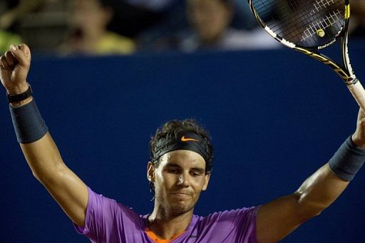Rafael Nadal of Spain celebrates after defeating compatriot Nicolas Almagro at the Mexico ATP Open,  on March 1, 2013