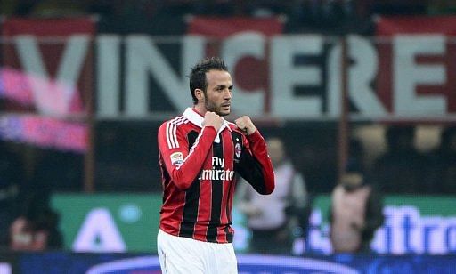 AC Milan&#039;s forward Giampaolo Pazzini celebrates after scoring on March 2, 2012 at San Siro Stadium in Milan