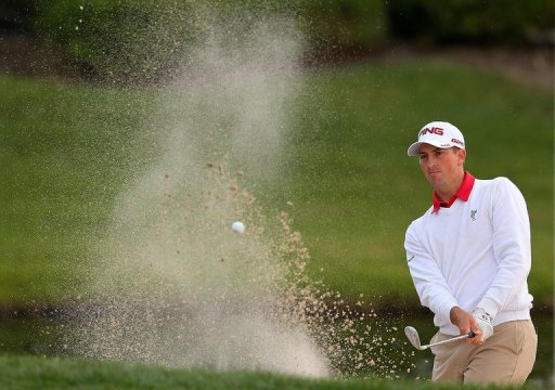 Michael Thompson plays out of the bunker on the 16th hole on March 2, 2013 in Palm Beach Gardens, Florida