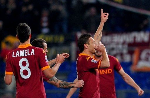 AS Roma&#039;s Francesco Totti celebrates after scoring on March 3, 2013 in Rome
