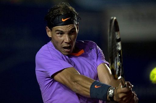 Rafael Nadal hits a return to Martin Alund of Argentina during the Mexico ATP Open in Acapulco on February 27, 2013