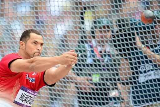 Koji Murofushi competes in the hammer throw qualifying rounds during the London 2012 Olympic Games on August 3, 2012