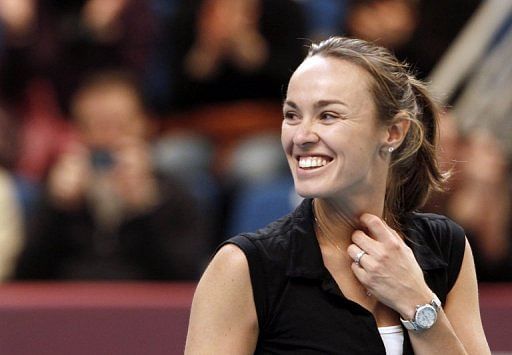 Switzerland&#039;s Martina Hingis smiles during her exhibition game as part of the Paris WTA tournament on February 12, 2012