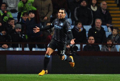 Manchester City&#039;s Carlos Tevez celebrates scoring in Birmingham on March 4, 2013