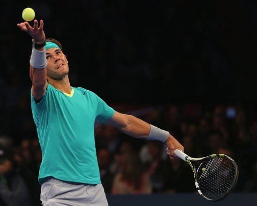 Rafael Nadal serves during an exhibition match against Argentina&#039;s Juan Martin Del Potro in New York on March 4, 2013