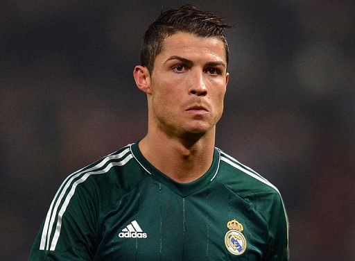 Real Madrid&#039;s Cristiano Ronaldo leaves the field in Manchester on March 5, 2013