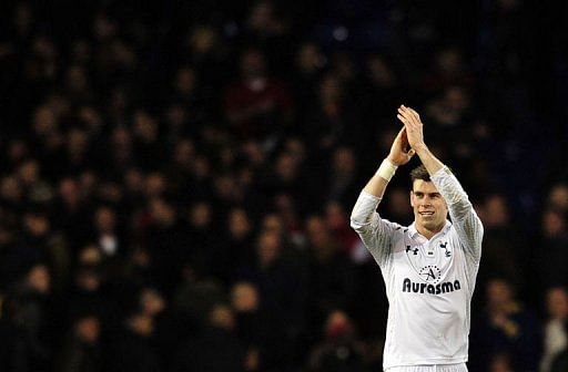 Tottenham Hotspur&#039;s Gareth Bale thanks the fans at White Hart Lane in north London on March 3, 2013
