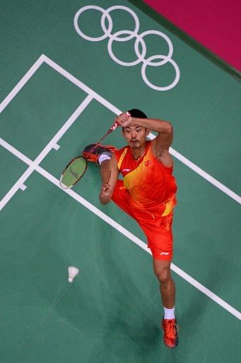 Lin Dan returns to Lee Chong Wei during the final at the Olympic Games in London on August 5, 2012