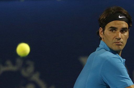 Roger Federer hits a backhand return during a match at ATP Dubai Open, in the Gulf emirate, on March 1, 2013