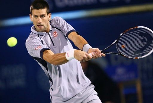 Novak Djokovic returns the ball during a match at ATP Dubai Open, in the Gulf emirate, on March 2, 2013
