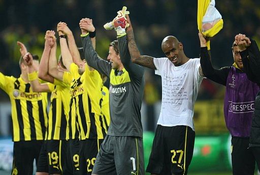 Borussia Dortmund celebrate beating Shakhtar Donetsk over two Champions League legs, on March 5, 2013