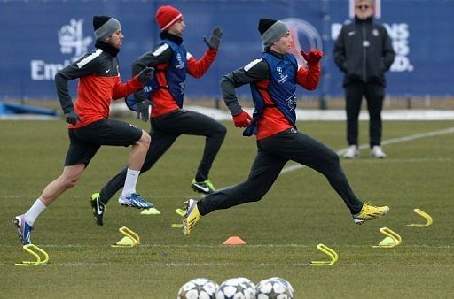PSG&#039;s (from L) Jeremy Menez, Javier Pastore and Maxwell, seen during a training session in Paris on March 5, 2013