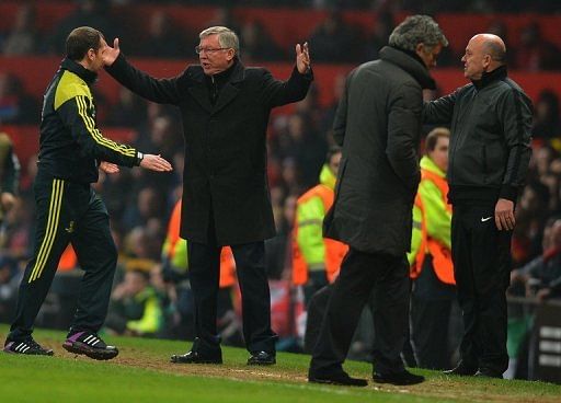 Manchester United manager Alex Ferguson berates the fourth official after seeing Nani sent off, on March 5, 2013