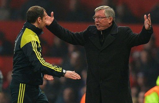 Alex Ferguson (R) reacts after Nani was sent off at Old Trafford on March 5, 2013