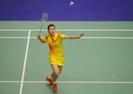 Li Xuerui of China hits a shot at the Hong Kong Open badminton tournament on November 24, 2012