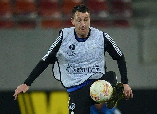 John Terry takes part in a training session on March 6, 2013, the eve of the Europa League clash at Steaua Bucharest