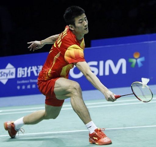 Chen Long of China returns a shot on December 16, 2012