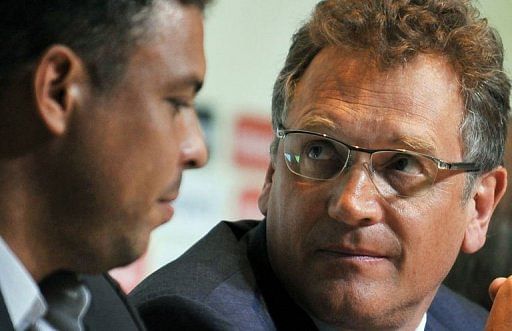 Jerome Valcke (R) and Ronaldo Nazario attend a press conference in Rio de Janeiro, Brazil, on March 7, 2013