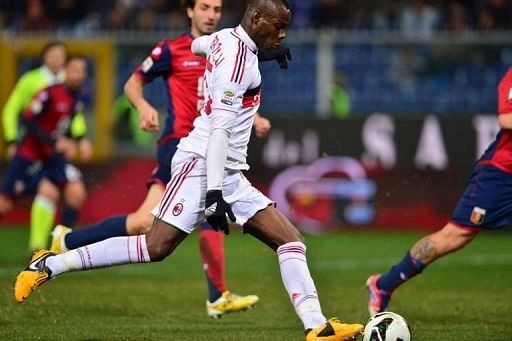 AC Milan&#039;s forward Mario Balotelli kicks to scores at the Marazzi Stadium in Genoa on March 8, 2013