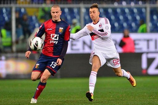 AC Milan&#039;s forward Stephan El Shaarawy (R) clashes with Genoa&#039;s defender Luca Antonelli on March 8, 2013