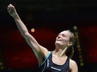 Denmark's Tine Baun celebrates winning against Indonesia's Lindaweni Fanetri on March 8, 2013