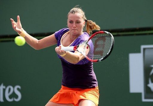 Petra Kvitova of the Czech Republic hits a return to Olga Govortsova of Belarus during on March 8, 2013 in Indian Wells