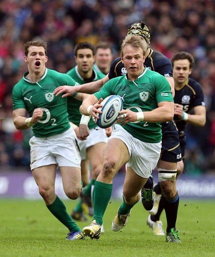 Luke Marshall of Ireland bursts towards the try line, at Murrayfield Stadium in Edinburgh, on February 24, 2013