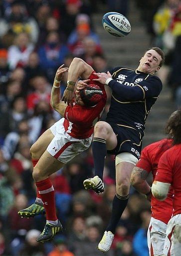 Scotland&#039;s Stuart Hogg (right) challenges Leigh Halfpenny during their Six Nations match in Edinburgh on March 9, 2013.