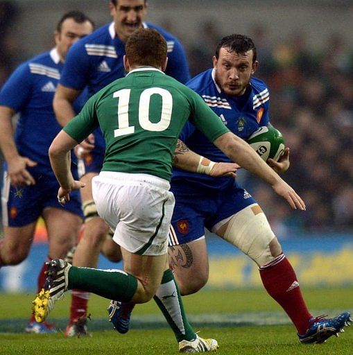 France&#039;s loose head prop Thomas Domingo (R) clashes with Ireland&#039;s fly half Paddy Jackson in Dublin on March 9, 2013