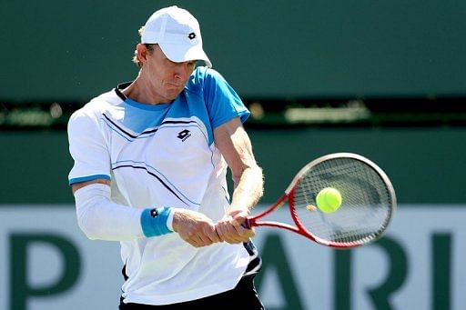 Anderson ousts Ferrer, Federer, Hewitt advance at Indian Wells