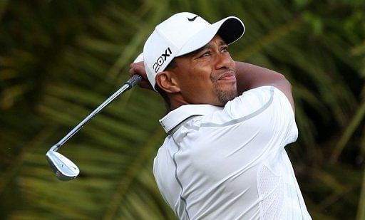 Tiger Woods hits his tee shot on the 15th hole on March 9, 2013 in Doral, Florida