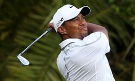 Career-best birdie binge brings Tiger four-stroke lead