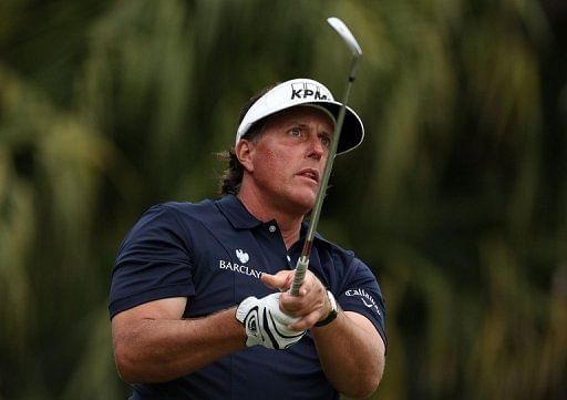 Phil Mickelson watches his tee shot on the 13th hole on March 9, 2013 in Doral, Florida